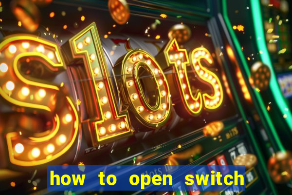 how to open switch oled game card slot