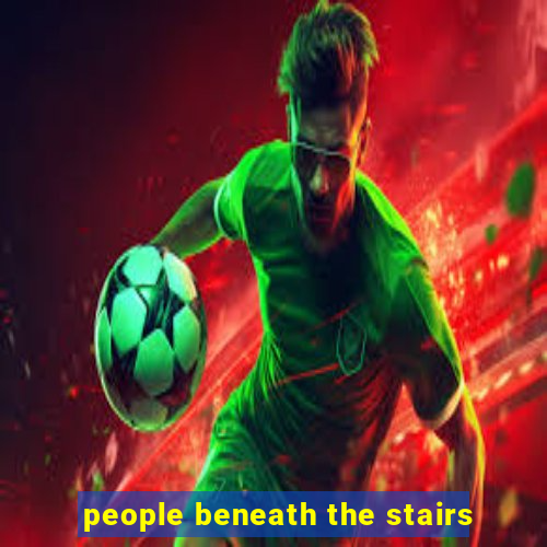 people beneath the stairs