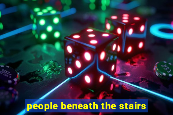 people beneath the stairs